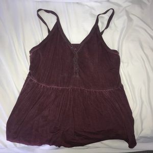 Maroon tank with buttons